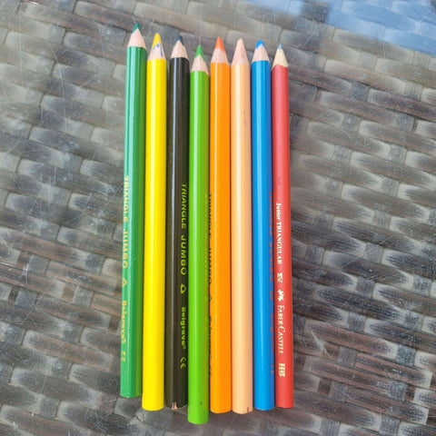 Triangular colour pencils and 1 pencil