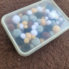 neutral colour pom poms