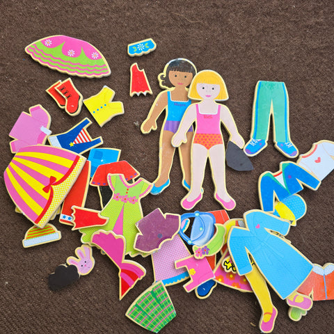 Magnetic dress up dolls