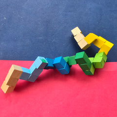 Wooden Multicolour Twisting Snake Toy – pre-loved puzzle from Toy Chest Pakistan