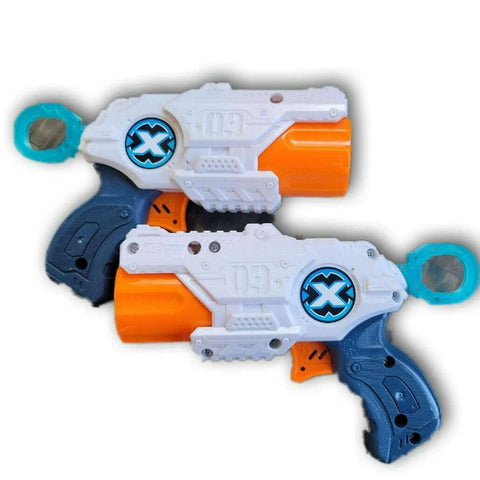 X shot pair of pistols