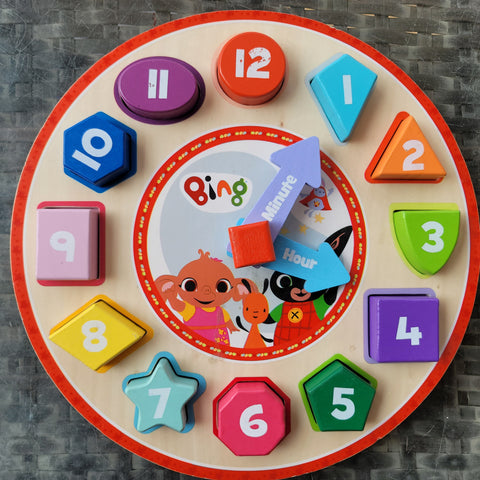 Wooden shape sorter clock