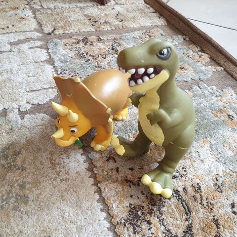 2 dinosaurs, rubber