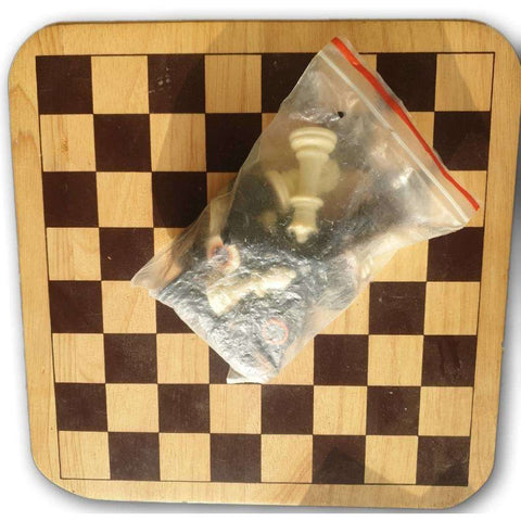 Wooden chess board, plastic pawns, boxless